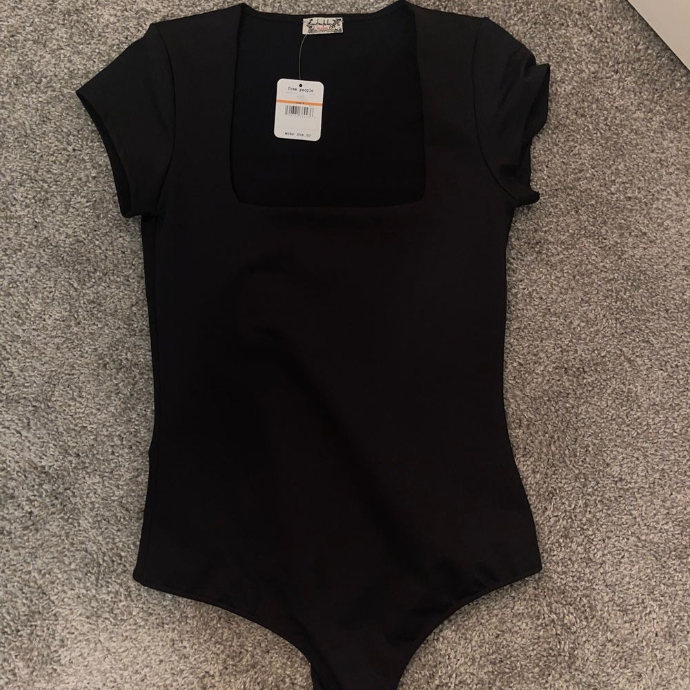 NWT Free people black bodysuit. Size small.